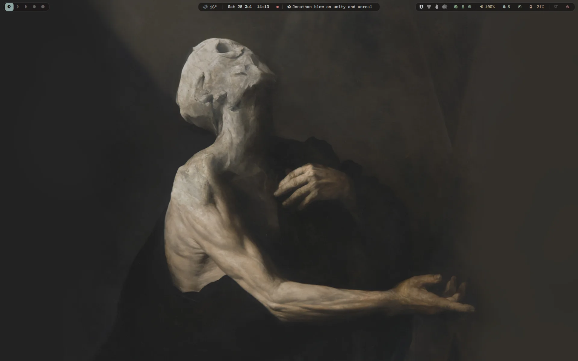 The Hyprland desktop: an empty workspace showing the wallpaper and the dragonbar strip across the top